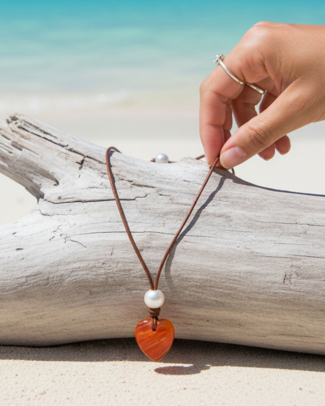 Wendy Mignot Orange Lions Paw Shell Heart and Freshwater Pearl and Leather Saba Love Necklace