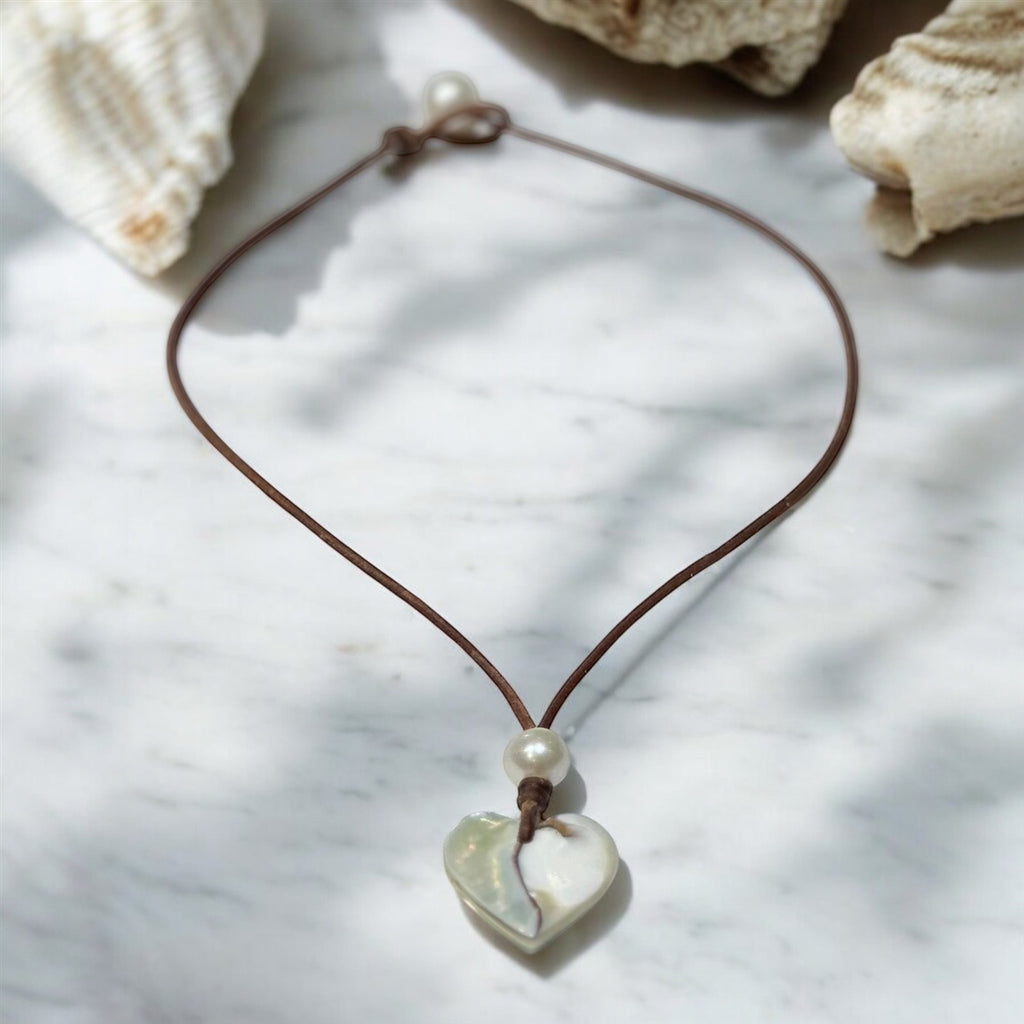 photo of Wendy Mignot Conch Shell Heart and Freshwater Pearl and Leather Love Saba Necklace