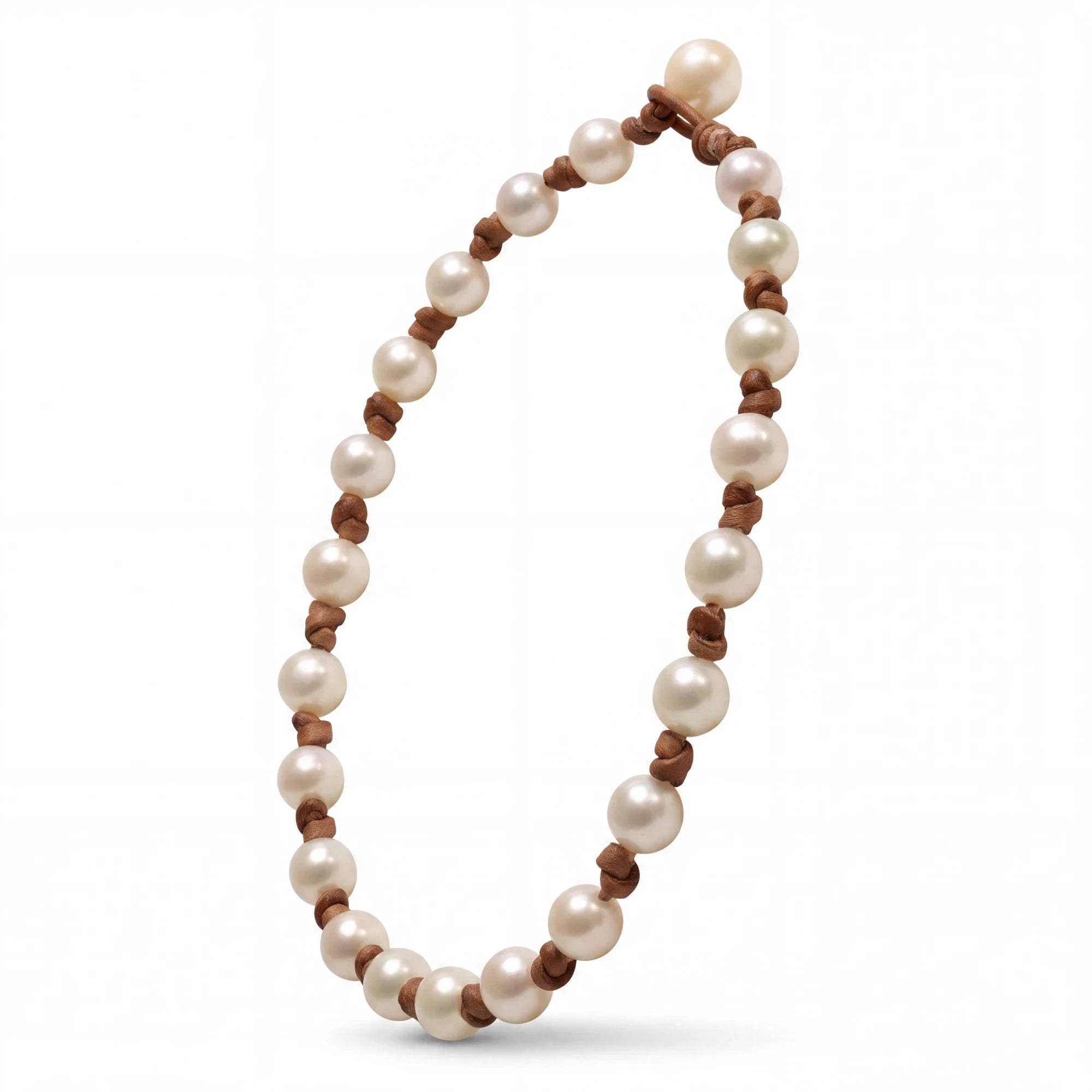 Wendy Mignot Fine Pearls and Leather Jewelry necklace featuring hand-knotted freshwater pearls on a brown leather cord.